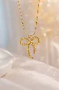 Golden Bow Necklace.webp